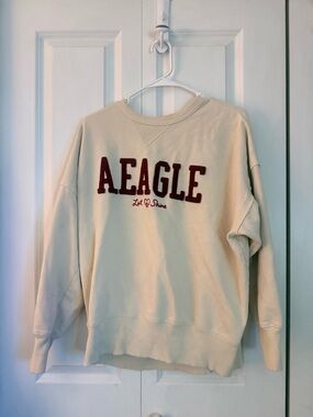 American Eagle Outfitters Cream Crewneck with Burgundy Applique